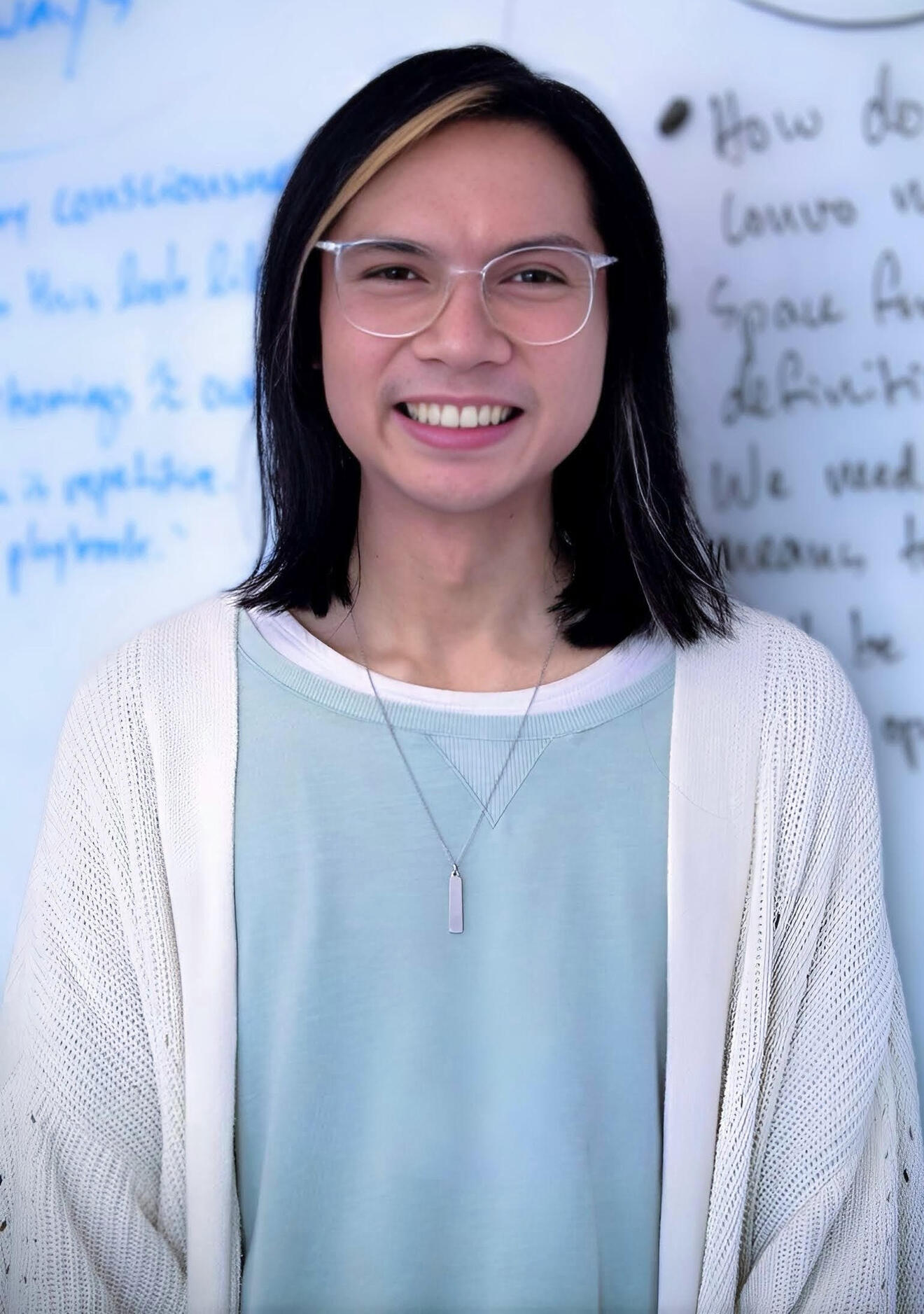 small group of workshop participants engaging in a session by Aaron Barlin at Elynndí: Learning and Development, Led by a Teacher